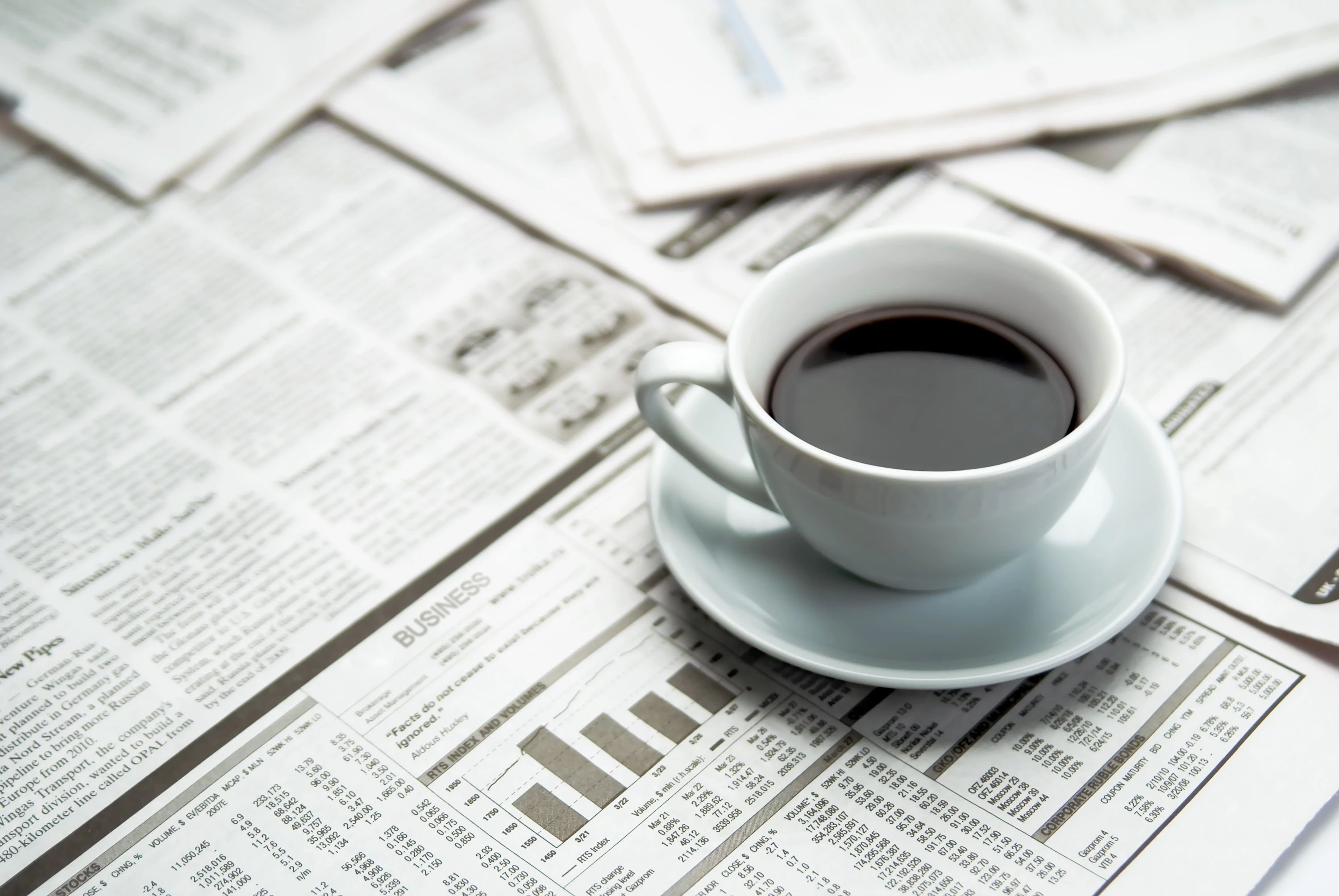 coffee on newspapers - from A.T. Frank Floors Across Michigan